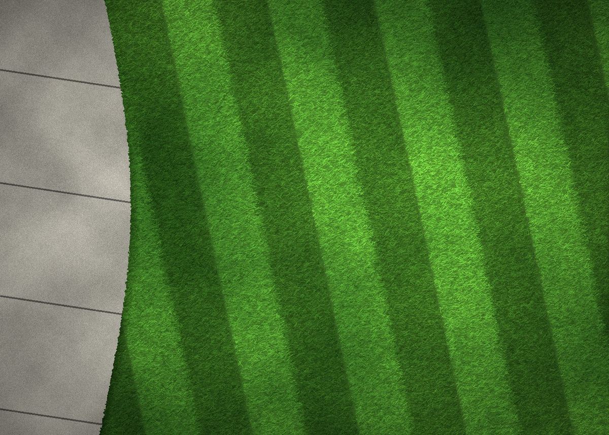 Striped, freshly mowed lawn beside a concrete walkway